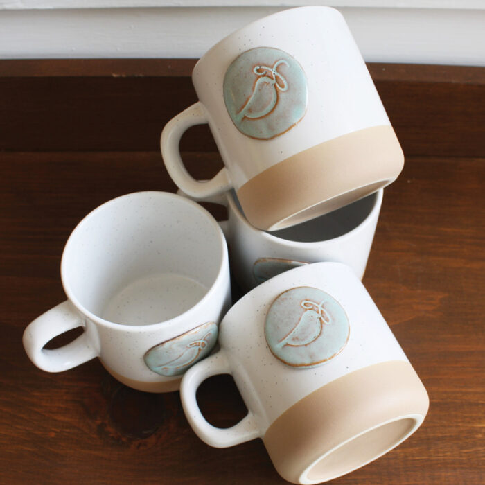 Prodigal pottery mugs with Bluebird Refuge logo 1