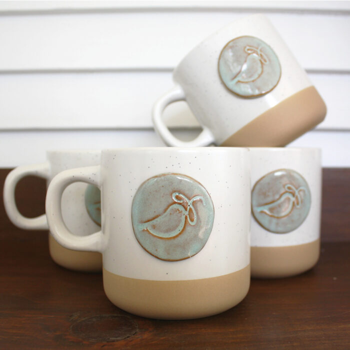 Prodigal pottery mugs with Bluebird Refuge logo 2