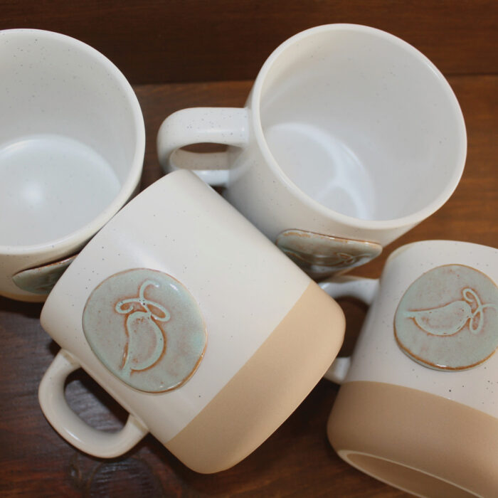 Prodigal pottery mugs with Bluebird Refuge logo 4